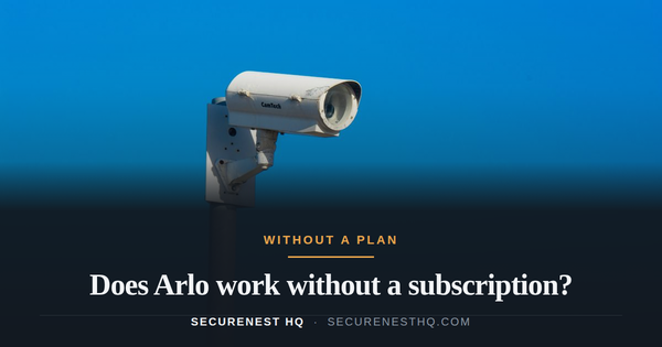 White security camera mounted on a pole under a clear blue sky, symbolizing security and surveillance. Overlaid text reads “Does Arlo work without a subscription?” — Secure Nest HQ