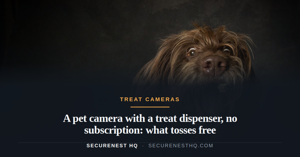 A shaggy brown terrier catching a treat in a darkly lit studio setting. Overlaid text reads “A pet camera with a treat dispenser, no subscription: what tosses free” — Secure Nest HQ