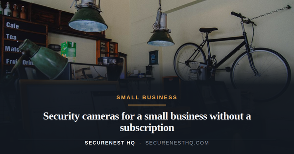 Inviting local coffee shop featuring vintage decor, green accents, and a suspended bicycle. Overlaid text reads “Security cameras for a small business without a subscription” — Secure Nest HQ