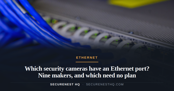 Detailed view of blue ethernet cables connected to a network switch in a data center. Overlaid text reads “Which security cameras have an Ethernet port? Nine makers, and which need no plan” —